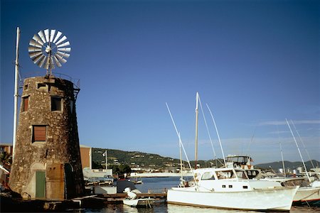 simsearch:625-01041167,k - View of boats at a harbor near a windmill, St. Croix, Virgin Islands Fotografie stock - Premium Royalty-Free, Codice: 625-01041067