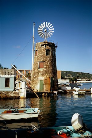 simsearch:625-01041167,k - View of a windmill near a harbor, St. Croix, U.S. Virgin Islands Fotografie stock - Premium Royalty-Free, Codice: 625-01041091