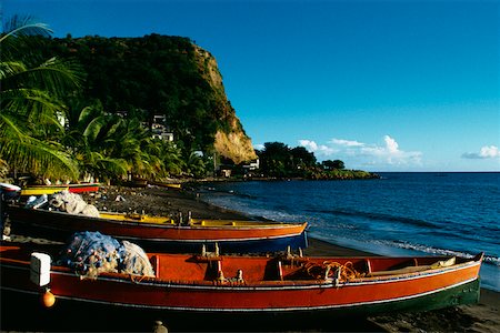 simsearch:625-01041156,k - Fishing boats lined up on a seashore, Martinique, Caribbean Foto de stock - Sin royalties Premium, Código: 625-01041176