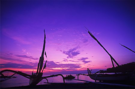 Silhouette of boats at dusk, Bali Indonesia Stock Photo - Premium Royalty-Free, Code: 625-01094149