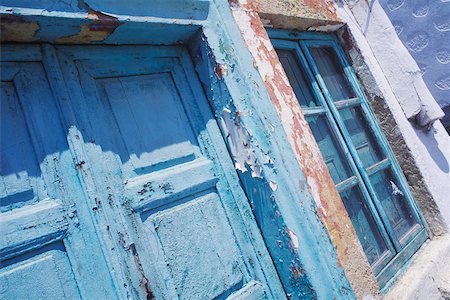 simsearch:614-01433957,k - Close-up of the closed door and a window of a house Stock Photo - Premium Royalty-Free, Code: 625-01094440