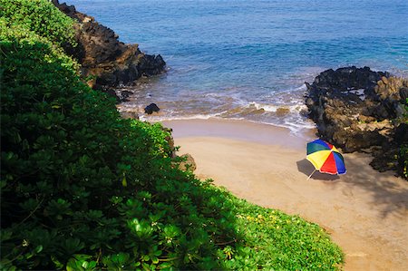 simsearch:625-01094251,k - High angle view of a beach umbrella on the beach, Hawaii, USA Fotografie stock - Premium Royalty-Free, Codice: 625-01094478