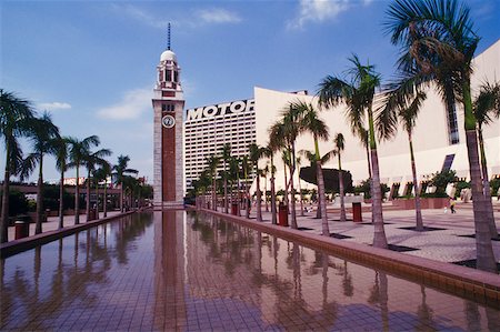 Clock tower in front of a building, Hong Kong, China Stock Photo - Premium Royalty-Free, Code: 625-01094517