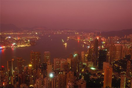 simsearch:625-01094363,k - High angle view of buildings in a city lit up at night, Hong Kong, China Foto de stock - Sin royalties Premium, Código: 625-01094535