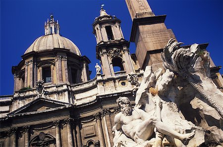 piazza navona - Statue in front of a building, Rome, Italy Foto de stock - Sin royalties Premium, Código: 625-01094567