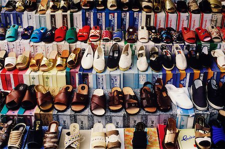 Shoes displayed at a market stall Italy Stock Photo - Premium Royalty-Free, Code: 625-01094607