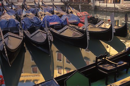 docked gondola buildings - Reflection of gondolas and a building in water, Italy Stock Photo - Premium Royalty-Free, Code: 625-01094610