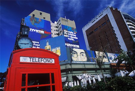 red call box - Telephone booth in front of buildings Stock Photo - Premium Royalty-Free, Code: 625-01094715