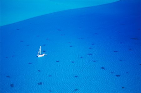 simsearch:625-01750899,k - Vue aérienne d'un bateau dans l'océan, Hawaii, USA Photographie de stock - Premium Libres de Droits, Code: 625-01094764