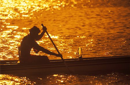 simsearch:625-01098372,k - Silhouette of a person rowing a boat at dusk, Hawaii, USA Stock Photo - Premium Royalty-Free, Code: 625-01094804