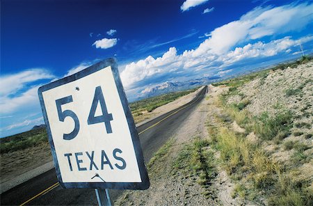 road side grass - Close-up of a distance sign on the roadside, Texas, USA Stock Photo - Premium Royalty-Free, Code: 625-01094818