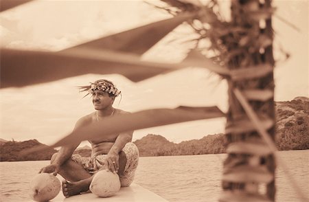 simsearch:625-01098372,k - Close-up of a young man sitting on a ship's bow, Hawaii, USA Stock Photo - Premium Royalty-Free, Code: 625-01094811