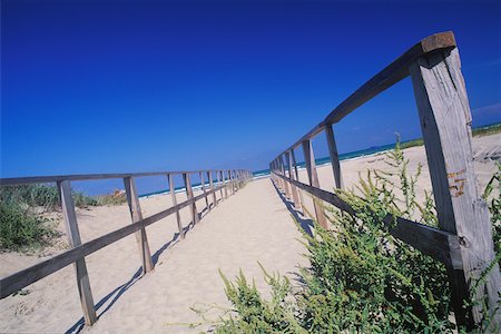 shrubs walkway - Clôture en bois sur la plage, Texas, USA Photographie de stock - Premium Libres de Droits, Code: 625-01094843