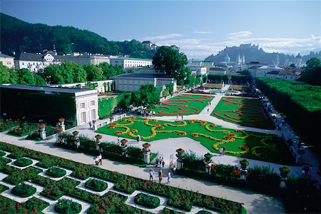 High angle view of a palace surrounded by a garden, Mirabell Palace, Salzburg, Austria Foto de stock - Sin royalties Premium, Código: 625-01095170