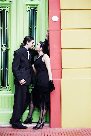 passion for shoes - Side profile of a young couple looking at each other Stock Photo - Premium Royalty-Free, Code: 625-01096079