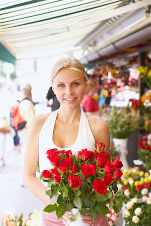 retail store - Portrait d'une jeune femme tenant un bouquet de fleurs dans un magasin de fleurs Photographie de stock - Premium Libres de Droits, Code: 625-01096085