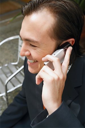 simsearch:625-01096675,k - Close-up of a businessman talking on a mobile phone Stock Photo - Premium Royalty-Free, Code: 625-01096301