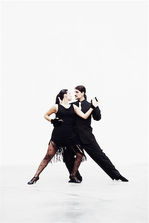dancing in pantyhose - Young couple tangoing Stock Photo - Premium Royalty-Free, Code: 625-01096451