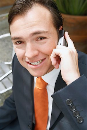 Portrait of a businessman talking on a mobile phone Stock Photo - Premium Royalty-Free, Code: 625-01096835