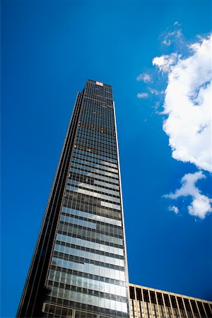 Low angle view of a skyscraper, Manhattan, New York City, New York State, USA Stock Photo - Premium Royalty-Free, Code: 625-01097109