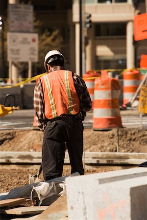 simsearch:625-01097225,k - Rear view of a construction worker standing at a construction site Stock Photo - Premium Royalty-Free, Code: 625-01097209