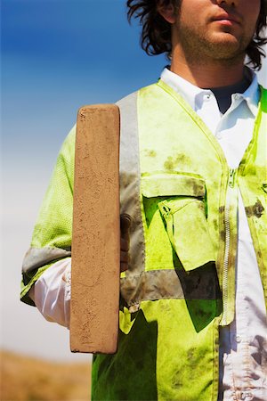 simsearch:625-01097225,k - Mid section view of a construction worker holding a hand tool Stock Photo - Premium Royalty-Free, Code: 625-01097226