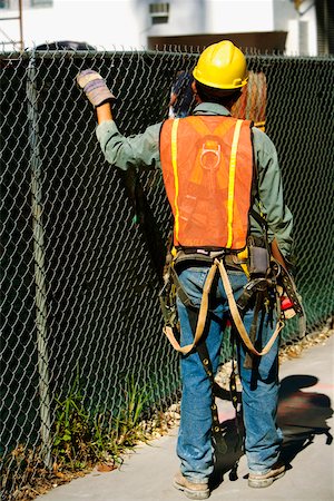 simsearch:625-01097231,k - Rear view of a construction worker, Miami, Florida, USA Stock Photo - Premium Royalty-Free, Code: 625-01097239