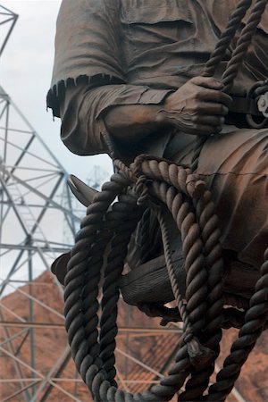 electricity towers images - Close-up of a construction worker sitting Stock Photo - Premium Royalty-Free, Code: 625-01097232