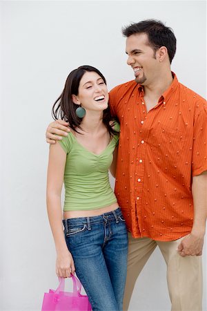 Close-up of a mid adult man with his arm around a teenage girl Stock Photo - Premium Royalty-Free, Code: 625-01097942