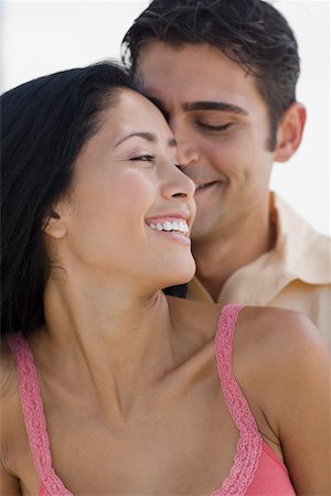 simsearch:625-01092667,k - Close-up of a young man embracing a young woman from behind Foto de stock - Sin royalties Premium, Código: 625-01098018