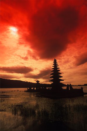 Silhouette of a temple in a lake, Puru Ulu Danau Temple, Bali, Indonesia Stock Photo - Premium Royalty-Free, Code: 625-01098212