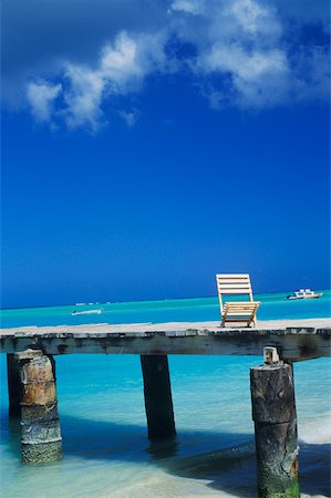 simsearch:625-01094251,k - Deck chair on a pier, Caribbean Fotografie stock - Premium Royalty-Free, Codice: 625-01098272
