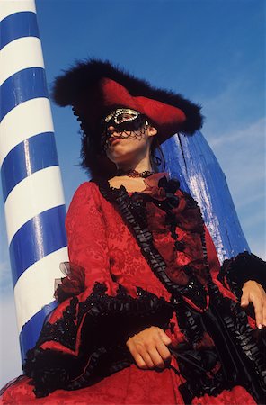 ethnicity of venice - Low angle view of a young woman wearing a costume, Venice, Veneto Italy Stock Photo - Premium Royalty-Free, Code: 625-01098427