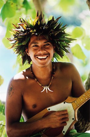 Gros plan d'un jeune homme jouant du ukulélé, Hawaii, USA Photographie de stock - Premium Libres de Droits, Code: 625-01098497