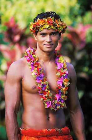 Portrait of a young man wearing a garland, Hawaii, USA Stock Photo - Premium Royalty-Free, Code: 625-01098490