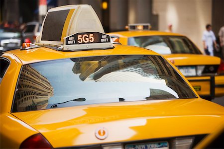 reflection on windshield - Reflection of buildings on the windshield of a yellow taxi, New York City, New York State, USA Stock Photo - Premium Royalty-Free, Code: 625-01092000