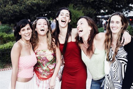 simsearch:625-02267530,k - Five young women standing with their arms around each other and laughing Stock Photo - Premium Royalty-Free, Code: 625-01092609