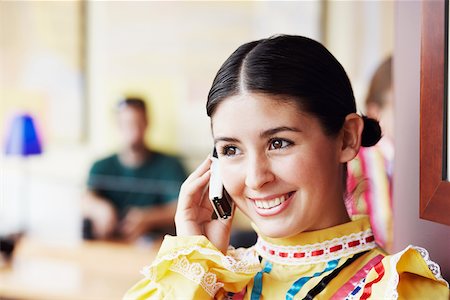 simsearch:625-01261416,k - Close-up of a young woman talking on a mobile phone Foto de stock - Royalty Free Premium, Número: 625-01093021