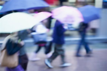 simsearch:862-03807701,k - Side profile of people walking under umbrellas, Tokyo, Japan Foto de stock - Royalty Free Premium, Número: 625-01093172