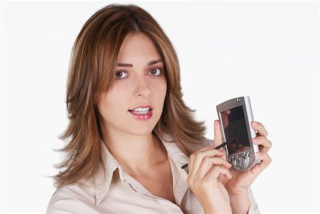 simsearch:625-01093712,k - Portrait of a businesswoman operating a hand held device with a digitized pen Stock Photo - Premium Royalty-Free, Code: 625-01093720