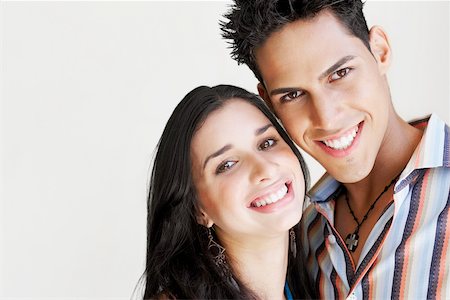 Portrait of a young couple smiling Stock Photo - Premium Royalty-Free, Code: 625-01093796