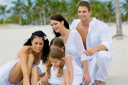 Group of people playing on the beach Stock Photo - Premium Royalty-Free, Code: 625-01093827