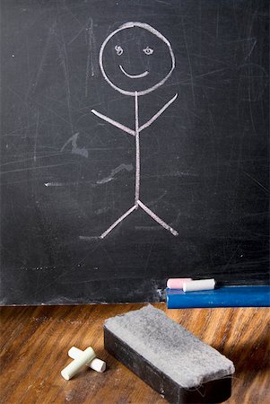 figura de palo - Close-up of a drawing of a stick figure on a blackboard Foto de stock - Sin royalties Premium, Código: 625-01249747