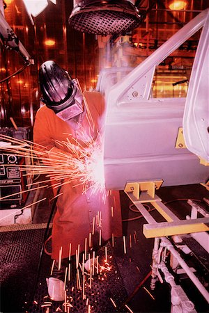 Welders working on car doors, Newark, Delaware Foto de stock - Sin royalties Premium, Código: 625-01250262