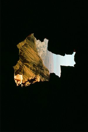 Mountain viewed from a dark cave, Masada, Dead Sea, Israel Fotografie stock - Premium Royalty-Free, Codice: 625-01250539