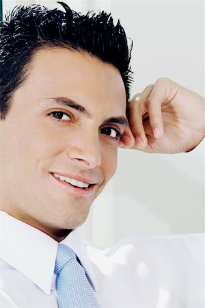 simsearch:625-01096675,k - Portrait of a businessman smiling Stock Photo - Premium Royalty-Free, Code: 625-01250644