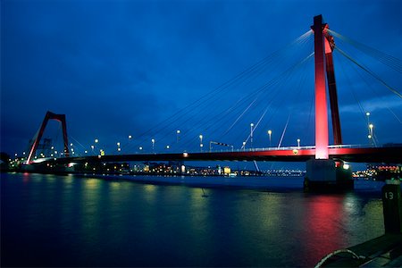 Suspension bridge across a river, Maas River, Rotterdam, Netherlands Stock Photo - Premium Royalty-Free, Code: 625-01250735