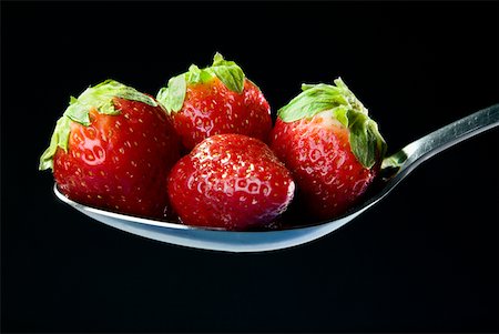 simsearch:625-01251856,k - Close-up of four strawberries in a spoon Stock Photo - Premium Royalty-Free, Code: 625-01251507