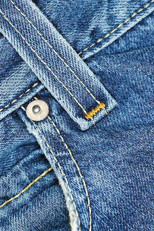 stitches - Close-up of a belt loop on a pair of jeans Stock Photo - Premium Royalty-Free, Code: 625-01251681