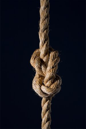 rope knot nobody - Close-up of a knot on a rope Stock Photo - Premium Royalty-Free, Code: 625-01251804